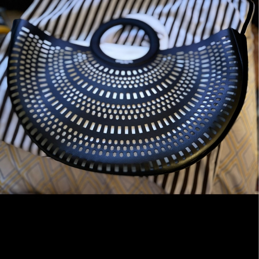 Henri Bendel black and white lasercut preforated tote